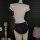 Sexy schoolgirl lingerie set featuring a white top with open-crotch design, cute miko-style look, perfect for pure and tempti...