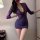 Woman wearing purple sexy secretary bodysuit dress with deep v lace top and mini skirt, posing indoors.