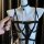 Sexy secretary costume with lacy hollow-out bodysuit, bondage chains, and choker for womens role play lingerie.