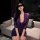 Woman in purple lace bodycon dress with matching lingerie, styled as a sexy secretary ol outfit for role play or date night.