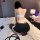 Woman wearing sexy secretary role play outfit - bodycon mini dress with black stockings and accessories for nightclub & bedro...