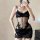 Woman wearing a sexy sheer lace bodysuit, featuring a tight mesh camisole dress with provocative bodycon slip design.
