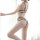Woman modeling sexy sheer lace lingerie set with hook-neck bra and panty, trendy -inspired transparent design.