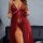 Woman wearing a sexy sheer lace sleep dress with floral details and a flowing robe, showcasing ultra-thin seductive nightwear...