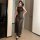Sexy high-slit beach cover-up dress set featuring sheer fabric, perfect for women seeking stylish swimwear with sun protectio...