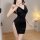 Woman wearing black deep v plunge sheath dress with sparkling side slit, part of sexy strap sleepwear set.