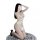 Woman in sexy strap sleepwear set with deep v plunge sheath dress, sparkling side slit, and secretary costume outfit.
