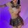 Sexy student uniform lingerie set featuring a plaid mini skirt with a sheer top and bow tie design, perfect for women seeking...