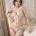 Woman modeling white lace three-piece lingerie set with open-crotch bikini bottom and sheer bralette, plus size seductive out...