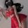 Woman lying on bed wearing red lace lingerie set with no-remove bra and matching outfit, suitable for small to plus size wome...