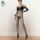 Woman modeling sheer mesh lace bodysuit with rhinestone embellishments and full-body corset design.