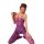 Woman kneeling in shiny purple sheer bodystocking with open-crotch design, featuring tear-away mesh and thigh-high style.