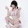 A woman poses wearing a white fuzzy christmas costume featuring a snowman-themed sexy lingerie bikini set with red accents an...