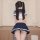 Sexy schoolgirl costume featuring a navy blue and white sailor-style top with matching pleated skirt, perfect for role play a...