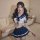 A stylish hot student uniform lingerie set featuring a sailor-style top with a bow tie and pleated skirt, perfect for role pl...