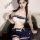 Woman modeling a navy and white sultry lace lingerie set for small busts, featuring a sheer open-crotch design and student ro...