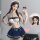 Woman in sailor-themed lingerie set with sheer details, posing for selfie. perfect for small busts, this sultry student rolep...