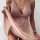 Elegant womens sexy camisole with intricate lace design, paired with sheer matching briefs, perfect for a sultry night out.