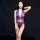 Woman modeling purple lace bodysuit with sheer panels and floral embroidery, tight-fit erotic lingerie set for summer.