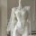 Sheer lace bodysuit with embroidery, perfect for summer nights. pure and tempting bedroom-ready set displayed on a mannequin.