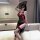 Woman wearing suoqing black sheer cheongsam lingerie with red trim, high slit, and lace fan—erotic role play outfit for coupl...