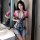 Woman in suoqing cosplay lingerie, anime-style bodysuit with dual zippers and open-crotch design, posing seductively.