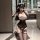 Woman in suoqing sexy bunny lingerie set - sheer lace open-crotch bodysuit with polka-dot gloves and bunny ears, posing in ba...