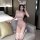 Woman wearing suoqing sexy bunny lingerie set - sheer lace bodysuit with bunny ears, romantic playful outfit for women.