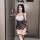 Woman wearing suoqing sexy bunny lingerie set — sheer lace open-crotch bodysuit with polka-dot gloves and bunny ears, romanti...