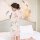 A woman stands by a bed wearing a floral-patterned sheer robe, part of the suoqing sexy lace chemise & sheer robe set, ideal ...