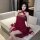 Elegant red sheer sleep dress with intricate lace detailing, exuding exotic elegance and perfect for a luxurious night.