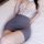 Woman wearing suoqing sexy lingerie set – pure & tempting secretary lace sleep dress with sheer mesh & bodycon skirt, lying o...