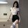 Woman modeling suoqing sexy low-cut navy collar bodysuit with sheer sleeves and black pencil skirt set, styled with striped t...