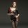 Woman wearing suoqing sexy sheer mesh bodysuit with short sleeves, open-crotch design, red devil horns, and trident — breatha...