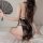 Vintage-inspired lace cheongsam lingerie featuring high-waist cut-out design with drip pendant detail, silk-soft feel.
