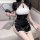 Vintage-inspired black and white retro qipao dress featuring high slit, puff sleeves, and lace trim, perfect for elegant even...