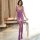 Woman wearing purple suoqing lace bodysuit with sheer mesh tights, open-crotch design, plus size erotic lingerie set.