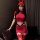 A woman models a red sweet fa fa sexy lingerie set, featuring an ultra-short bodycon skirt and a tight tee, perfect for night...