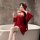 A woman poses elegantly in a red tang dynasty style sensual backless hanfu costume set, featuring intricate embroidery and fl...