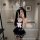 Woman in navy sailor-style lingerie with white bow and bunny ears, taking a mirror selfie. tangdao sensual lingerie set for w...