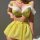 Yellow lace bra with sheer fabric accents paired with a matching floral mesh mini skirt, perfect for sexy role play lingerie ...