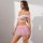 Woman modeling pink floral mesh mini skirt and lace bralette from temu pure & playful lingerie set with garters and choker...