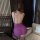 Woman wearing purple tonaer sexy lace chemise, sheer mesh babydoll nightgown set with open back and thin straps.