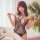 Woman wearing transparent lace bodysuit with open-cup bra and thong set, seductive mesh romper for adults in bathroom setting...
