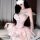 Elegant pink lace sleepwear set featuring a sheer mesh bralette and matching tulle skirt, perfect for feminine allure.