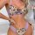 Woman wearing transparent mesh lace bra set with embroidered sheer cups and matching panties, featuring sexy push-up design.