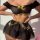 Sexy sheer black off-shoulder lingerie set with gold sparkle trim and bow detail.