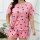 Trendy womens sexy print lounge set featuring a loose short sleeve top and shorts with playful black heart patterns, perfect ...