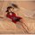 Sexy red lace dress with black trim, elegant design, perfect for evening wear or intimate settings.