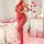 Valentines heart rhinestone bodysuit - sheer mesh open-crotch lace-up corset top & fishnet stockings set, showcased on a bed ...